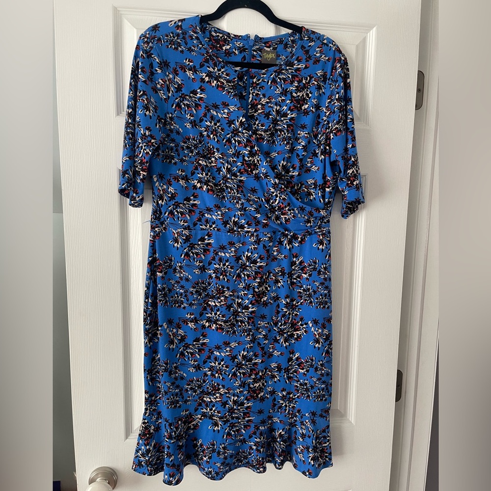 Blue Floral Knee Length Dress With V Neck Keyhole Neck And Hem Flounce